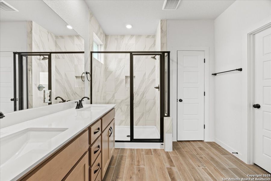 Furnished interior view inside a new home in Stream Waters, Seguin (Image 9).