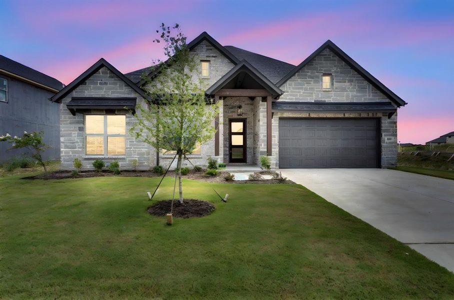 Front exterior of a new home in , Venus, TX, highlighting curb appeal (Image 21). Front exterior of a new home in , Venus, TX, highlighting curb appeal (Image 21).