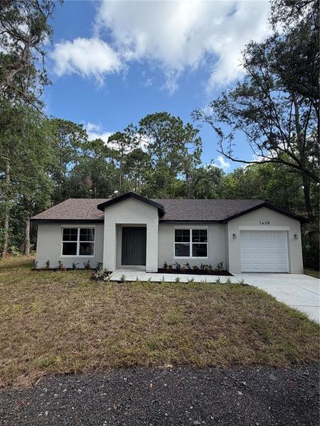 Front exterior of a new home in , Geneva, FL, highlighting curb appeal (Image 1). Front exterior of a new home in , Geneva, FL, highlighting curb appeal (Image 1).