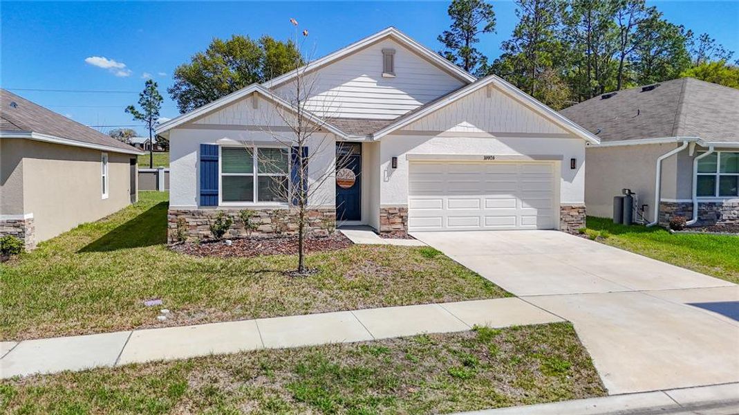 Front exterior of a new home in , San Antonio, FL, highlighting curb appeal (Image 28).