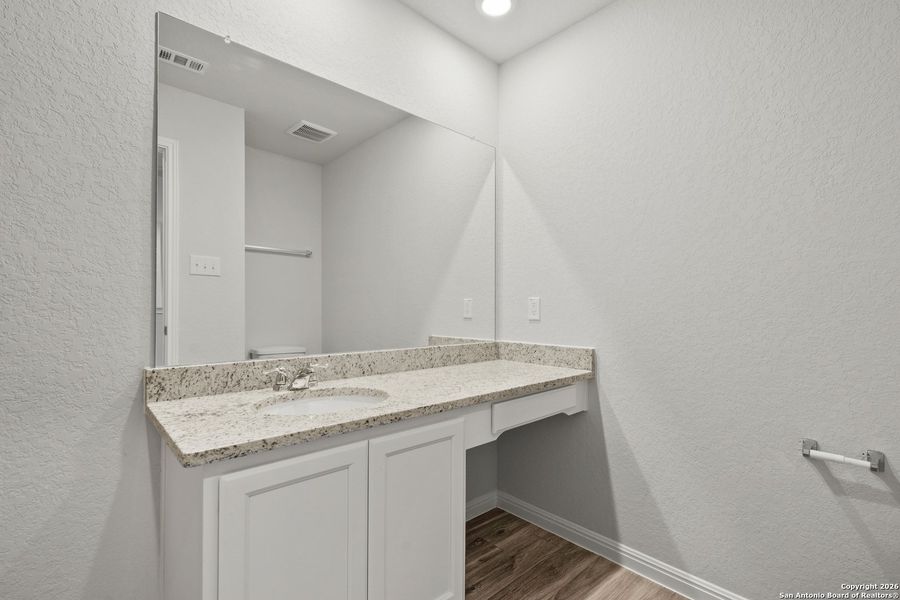 Furnished interior view inside a new home in Cinco Lakes, San Antonio (Image 10).