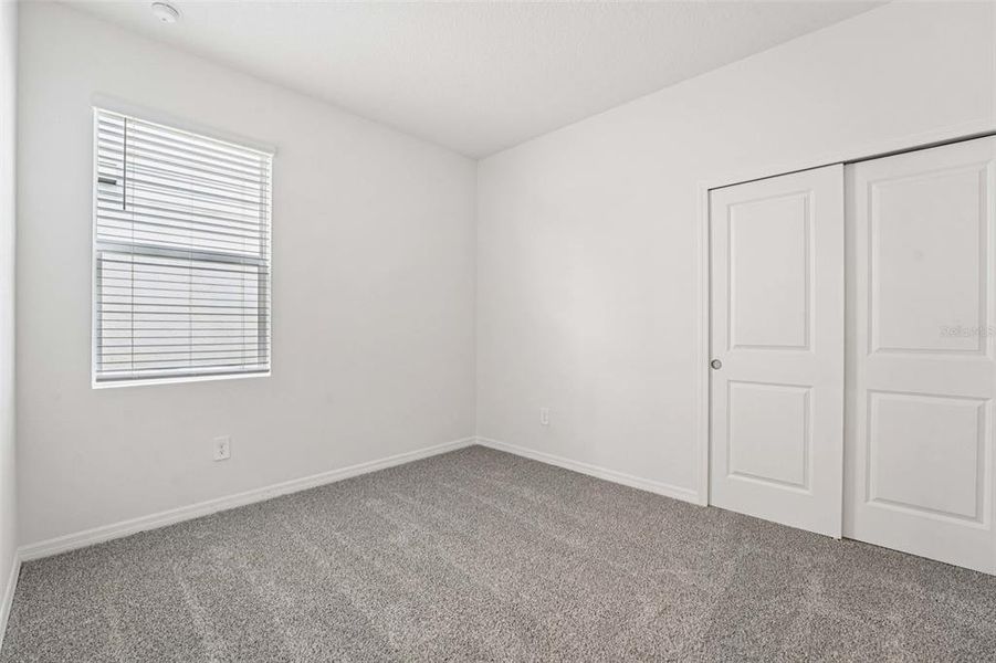 Spacious, unfurnished interior of a new home in The Grove at Stuart Crossing - Premier Series, Bartow (Image 10). Spacious, unfurnished interior of a new home in The Grove at Stuart Crossing - Premier Series, Bartow (Image 10).