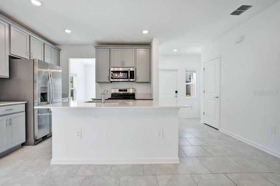 Furnished interior view inside a new home in Wellness Ridge, Clermont (Image 6).