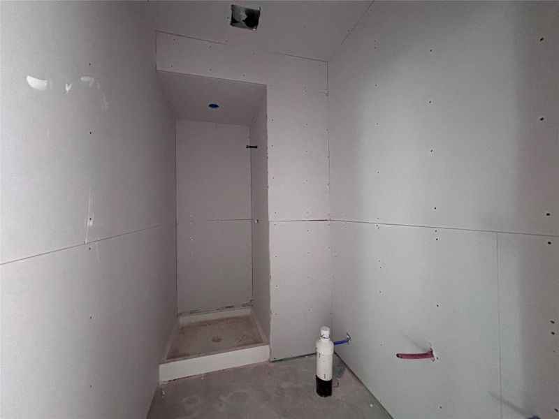 In-progress construction of a new home in The Colony, Bastrop, TX (Image 35).