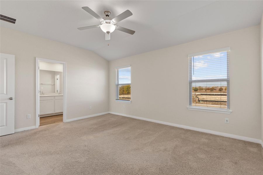 Master Bedroom alt view carpet, ceiling fan, and connected bathroom Master Bedroom alt view carpet, ceiling fan, and connected bathroom