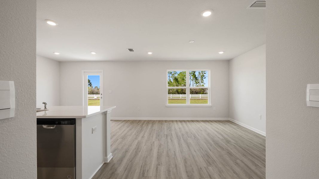 Spacious, unfurnished interior of a new home in Magnolia at the Bluffs Phase 3, Freeport (Image 10).
