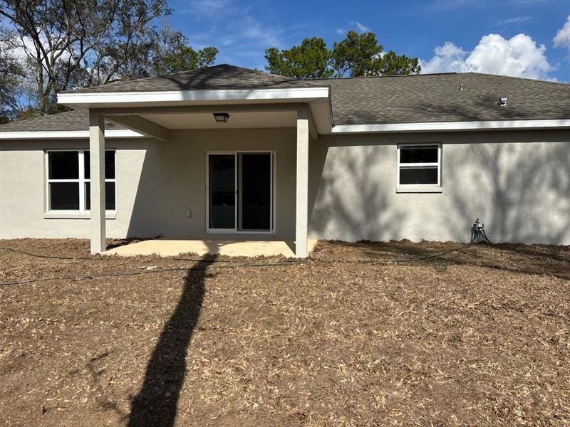Exterior details and patio area of a home in , Citrus Springs (Image 4).
