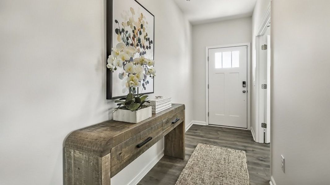 Representative furnished interior of a home built from the Wilmington by D.R. Horton in Honeycutt Oaks, Angier (Image 4). Representative furnished interior of a home built from the Wilmington by D.R. Horton in Honeycutt Oaks, Angier (Image 4).