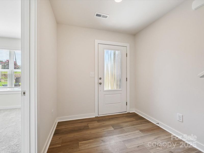 Spacious, unfurnished interior of a new home in Central Living at Craig, Charlotte (Image 24).