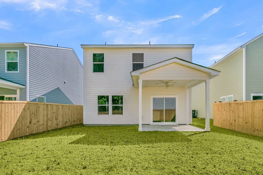 Exterior details and patio area of a home in Central Creek, Goose Creek (Image 29).