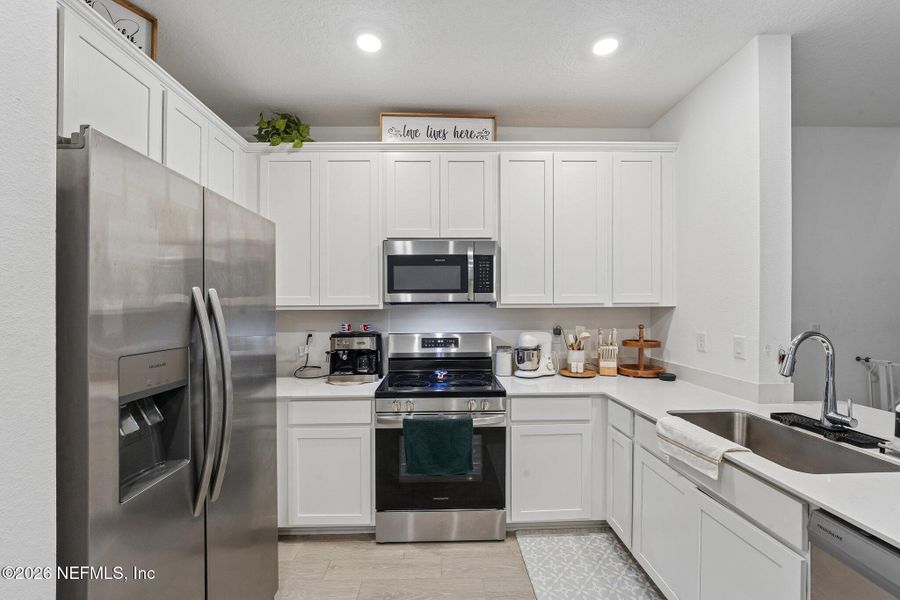 Furnished interior view inside a new home in Longbay Townhomes, Middleburg (Image 17).
