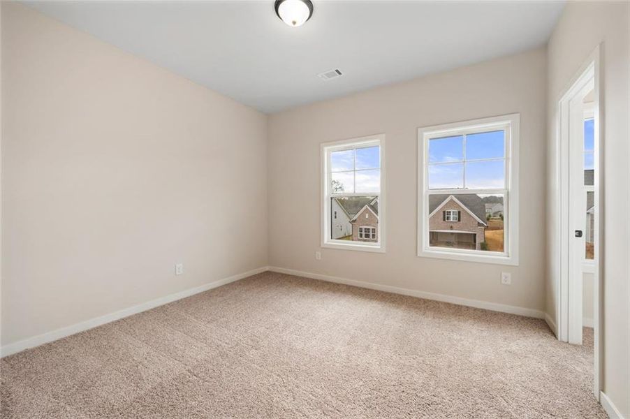 Spacious, unfurnished interior of a new home in Ponderosa Farms Manor, Gainesville (Image 42).