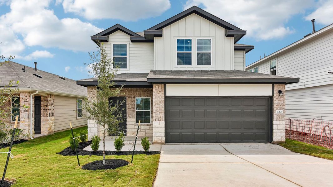 Representative exterior photo of a completed home built from the The Florence by D.R. Horton in Carillon, Manor, TX (Image 2). Representative exterior photo of a completed home built from the The Florence by D.R. Horton in Carillon, Manor, TX (Image 2).