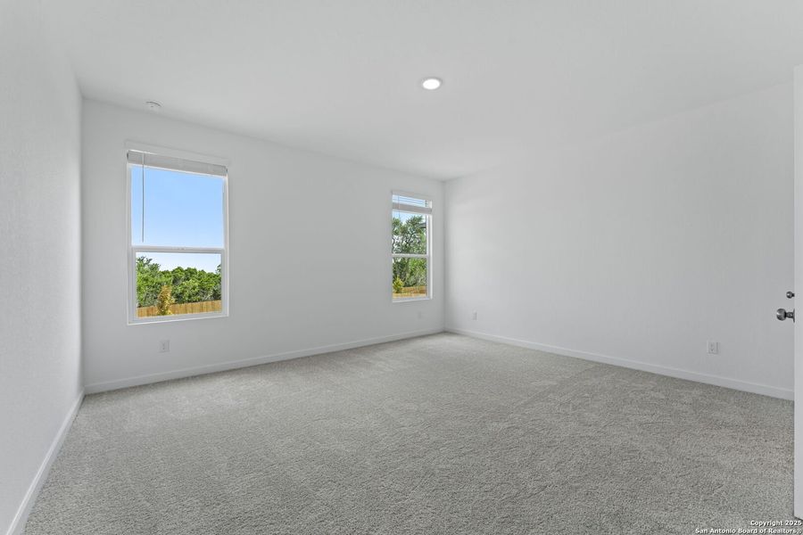 Spacious, unfurnished interior of a new home in Waterwheel: Coastline Collection, San Antonio (Image 19).