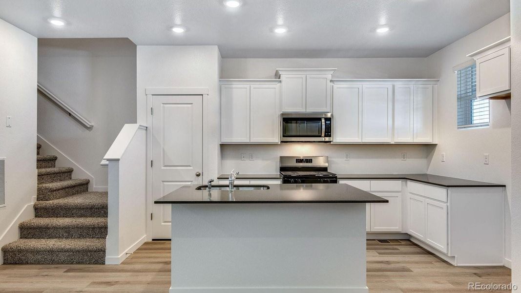Furnished interior view inside a new home in Settlers Crossing, Commerce City (Image 9).