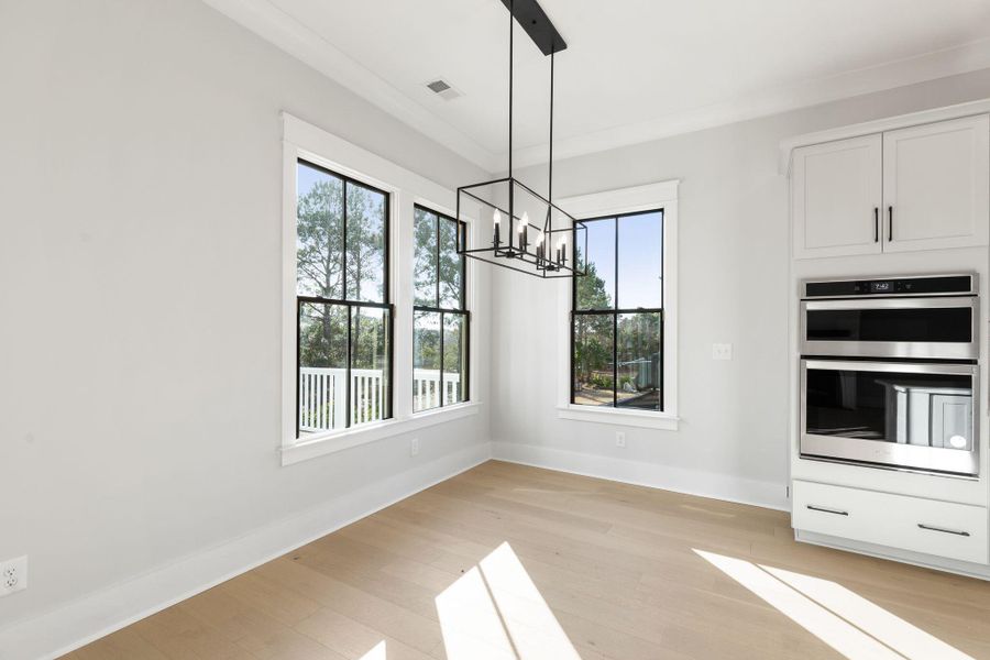 Spacious, unfurnished interior of a new home in Rivercroft, Awendaw (Image 40).