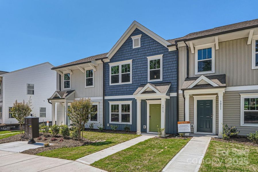 Front exterior of a new home in Dukes Ridge, Charlotte, NC, highlighting curb appeal (Image 2).