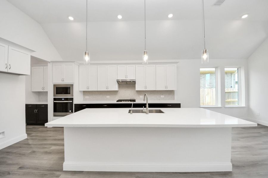 Furnished interior view inside a new home in ARTAVIA, Conroe (Image 6).