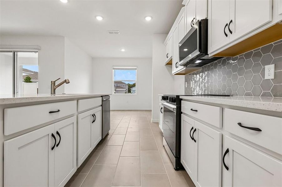 Furnished interior view inside a new home in Trinity Place, St. Cloud (Image 6).