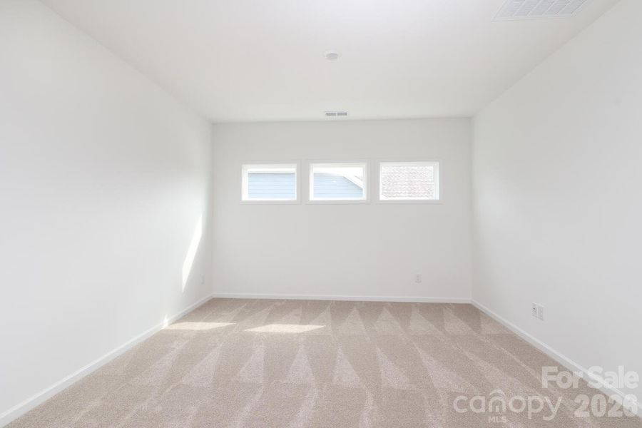 Spacious, unfurnished interior of a new home in Estates at Sugar Creek, Indian Land (Image 33).