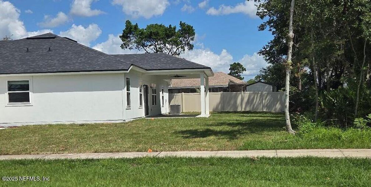 Front exterior of a new home in , Jacksonville, FL, highlighting curb appeal (Image 19). Front exterior of a new home in , Jacksonville, FL, highlighting curb appeal (Image 19).
