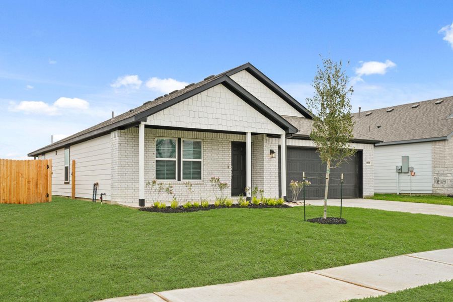 Front exterior of a new home in Valor Park, Bay City, TX, highlighting curb appeal (Image 16).