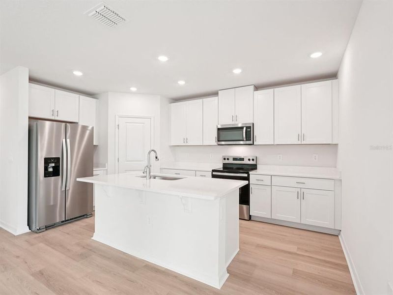 Furnished interior view inside a new home in Magnolia Bay - Classic Series, Nokomis (Image 8). Furnished interior view inside a new home in Magnolia Bay - Classic Series, Nokomis (Image 8).