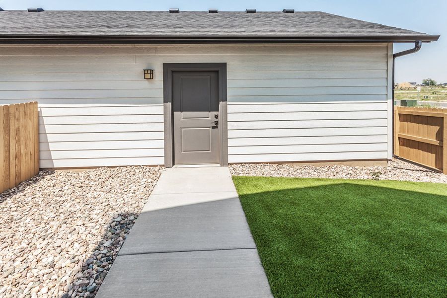 Exterior details and patio area of a home in Prairie Song, Windsor (Image 26). Exterior details and patio area of a home in Prairie Song, Windsor (Image 26).