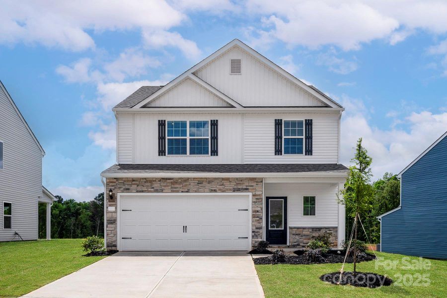 Front exterior of a new home in Ascot Woods, Charlotte, NC, highlighting curb appeal (Image 2).