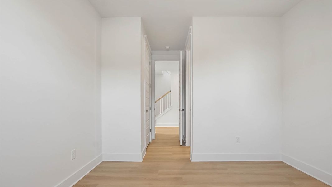 Representative unfurnished interior of a home built from the Trenton by D.R. Horton in Parkside, Santa Rosa Beach (Image 21).