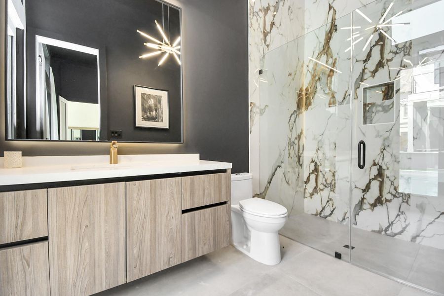 Downstairs ensuite bathroom with standing shower. Downstairs ensuite bathroom with standing shower.