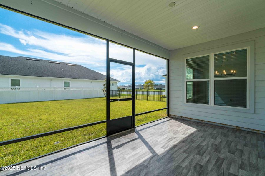 Exterior details and patio area of a home in Courtney Oaks in SilverLeaf, St. Augustine (Image 2). Exterior details and patio area of a home in Courtney Oaks in SilverLeaf, St. Augustine (Image 2).