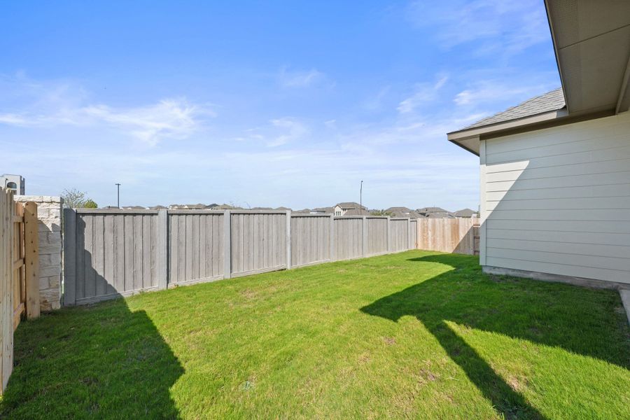Exterior details and patio area of a home in Park Central, Georgetown (Image 24).