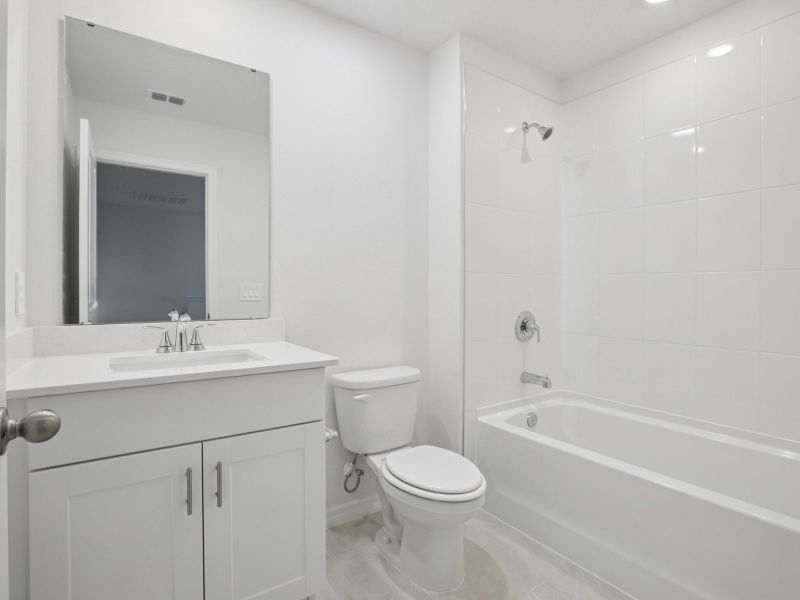 Furnished interior view inside a new home in Cagan Crossings West, Clermont (Image 5).