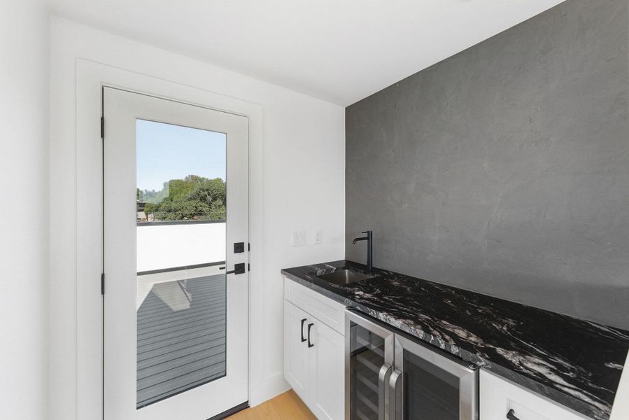 Private bar area for 2 roof top decks Private bar area for 2 roof top decks