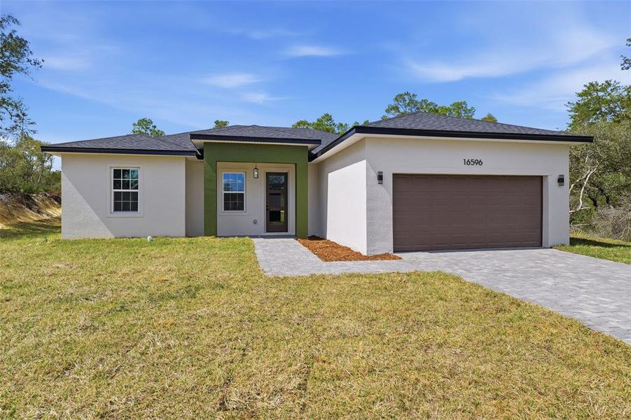 Front exterior of a new home in , Ocala, FL, highlighting curb appeal (Image 19).