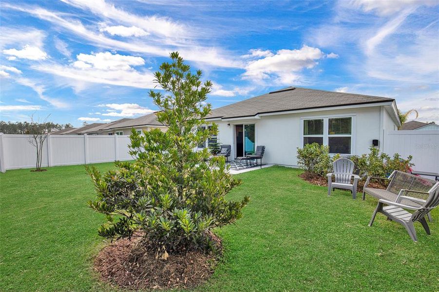 Exterior details and patio area of a home in Sawmill Branch, Palm Coast (Image 26).