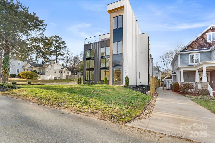 Front exterior of a new home in , Charlotte, NC, highlighting curb appeal (Image 2). Front exterior of a new home in , Charlotte, NC, highlighting curb appeal (Image 2).