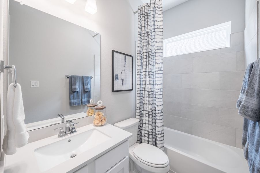 Representative furnished interior of a home built from the Barnhart by Tri Pointe Homes in Dunham Pointe, Cypress (Image 47).
