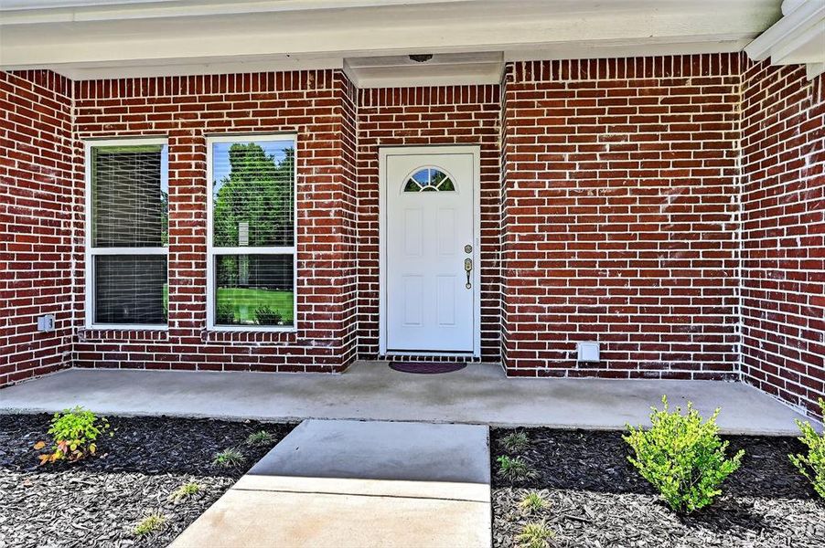 Front exterior of a new home in , Ector, TX, highlighting curb appeal (Image 23). Front exterior of a new home in , Ector, TX, highlighting curb appeal (Image 23).
