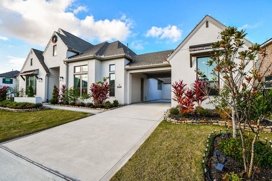 Front exterior of a new home in , Cypress, TX, highlighting curb appeal (Image 2). Front exterior of a new home in , Cypress, TX, highlighting curb appeal (Image 2).