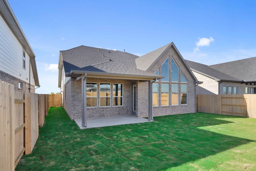 Exterior details and patio area of a home in Elyson 45' & 70', Katy (Image 3).