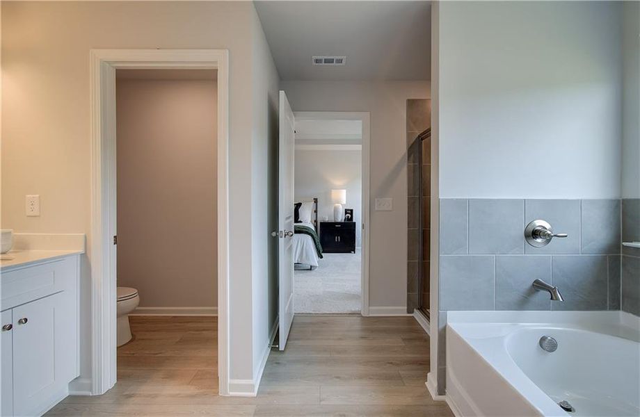 Furnished interior view inside a new home in Enclave at Evergreen, Fairburn (Image 26).