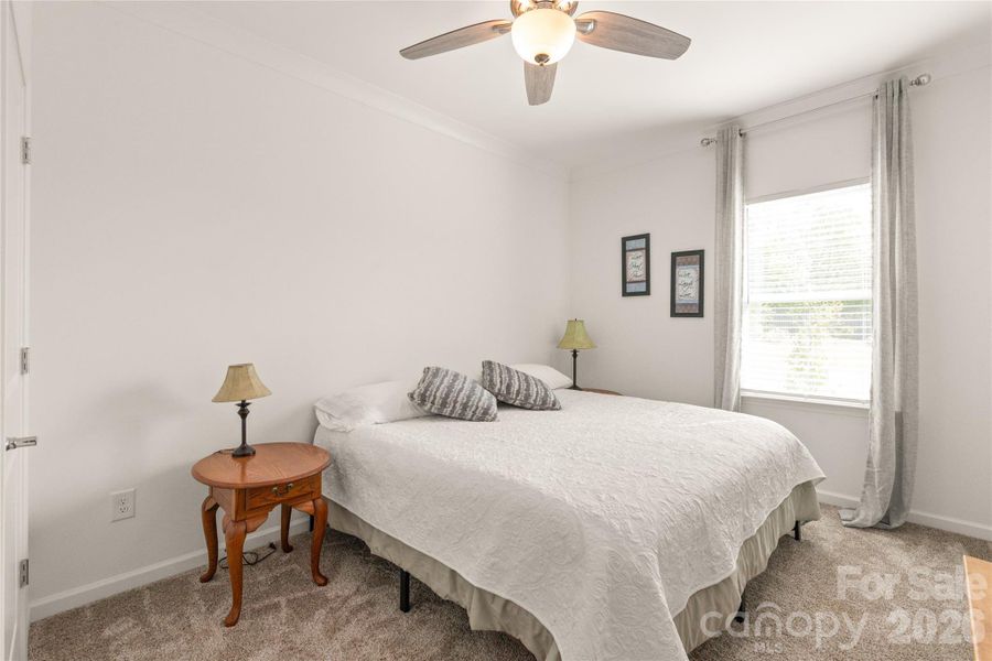 A guestroom on the main floor is perfect for company or multi-generational living