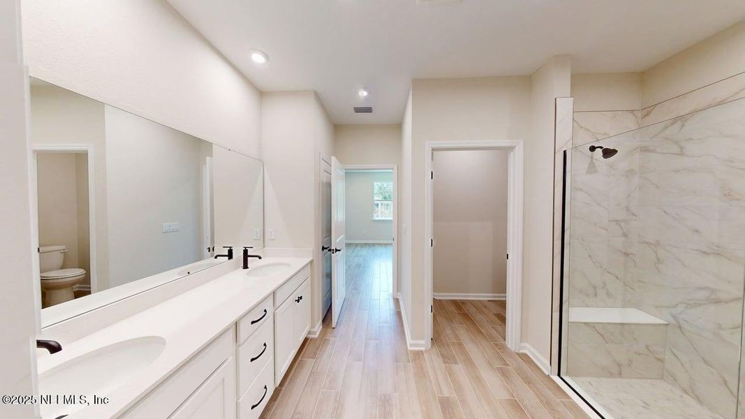 Furnished interior view inside a new home in RiverTown - WaterSong, St. Johns (Image 9). Furnished interior view inside a new home in RiverTown - WaterSong, St. Johns (Image 9).