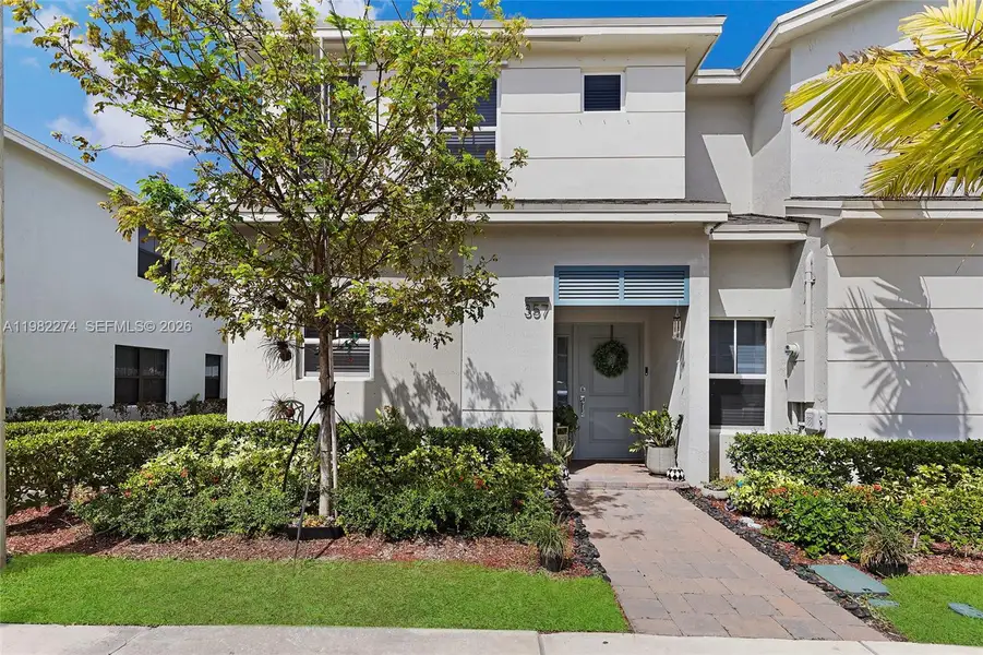 Front exterior of a new home in Sebastian Isles, Florida City, FL, highlighting curb appeal (Image 2). Front exterior of a new home in Sebastian Isles, Florida City, FL, highlighting curb appeal (Image 2).