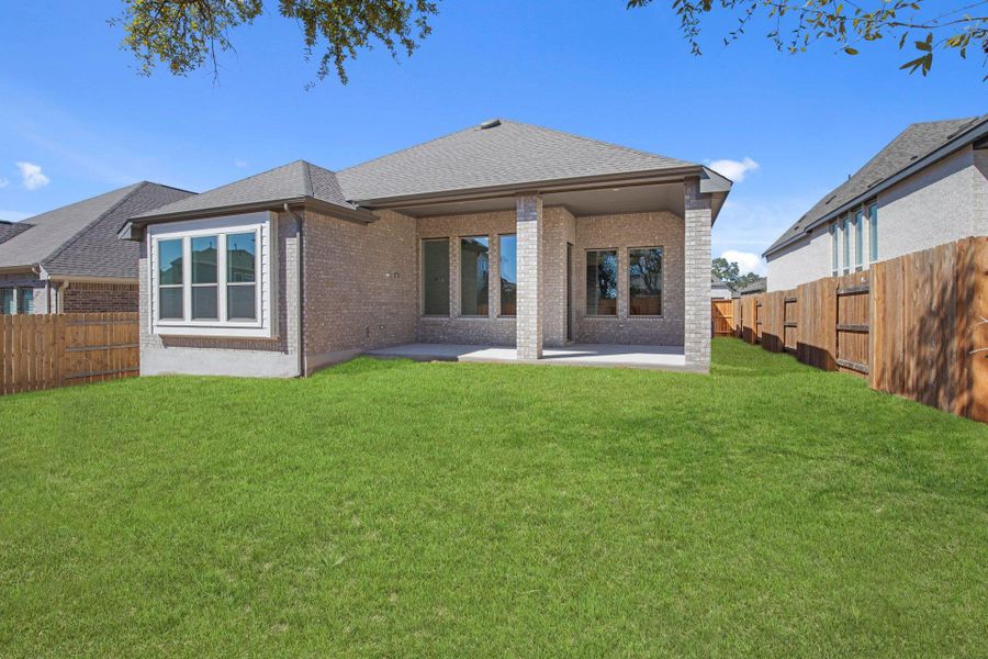 Rear of Home and Private Backyard