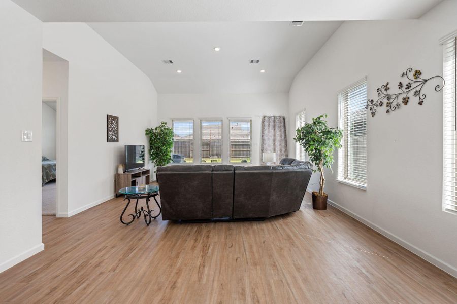 Area between the kitchen and living area is meant for a breakfast area, and is large enough for a dining table.