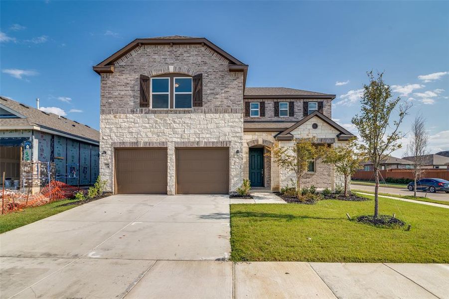 Front exterior of a new home in Heartland, Crandall, TX, highlighting curb appeal (Image 19).