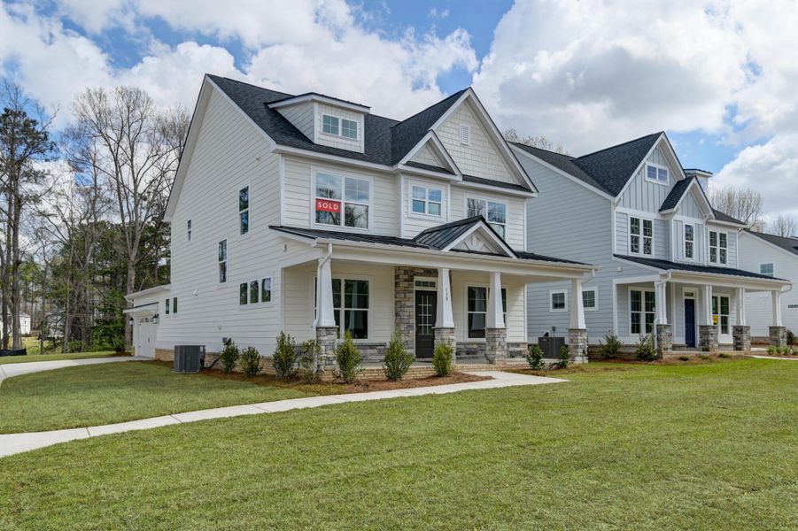Front exterior of a new home in Clubside Reserve at Summerlake, Lexington, SC, highlighting curb appeal (Image 19).